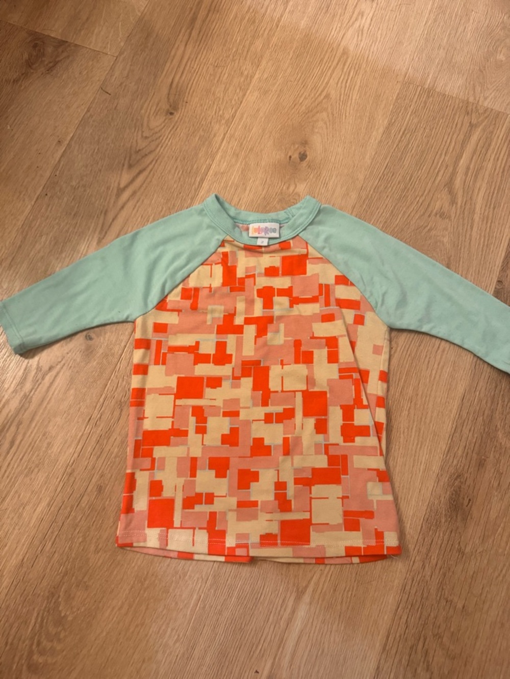 LuLaRoe Mint and Coral Geometric Top